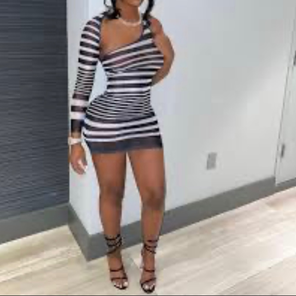 Black and white striped dress with sleeve. Size small